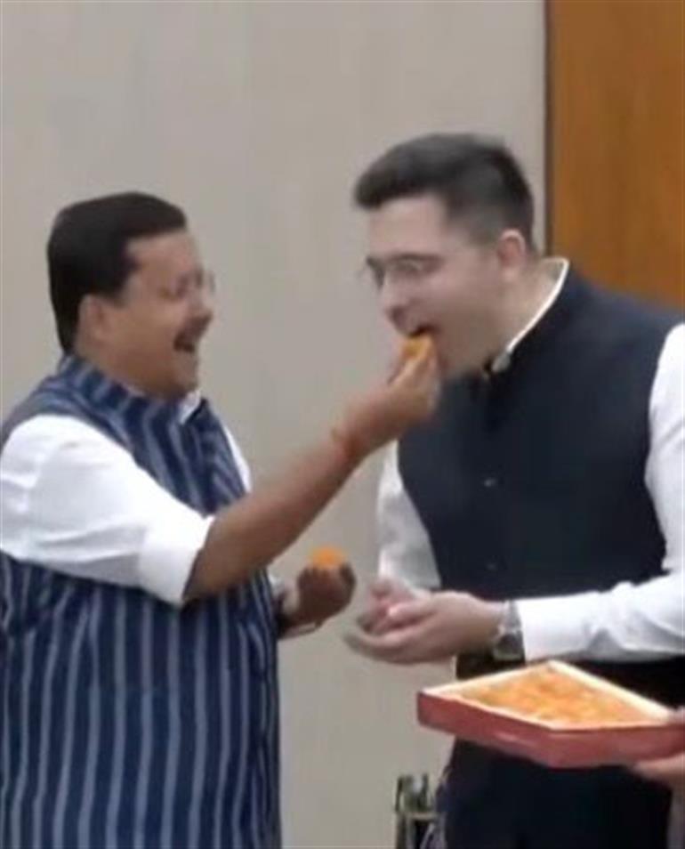Raghav Chadha Joins BJP; Nitin Nabin Welcomes Him with Sweets