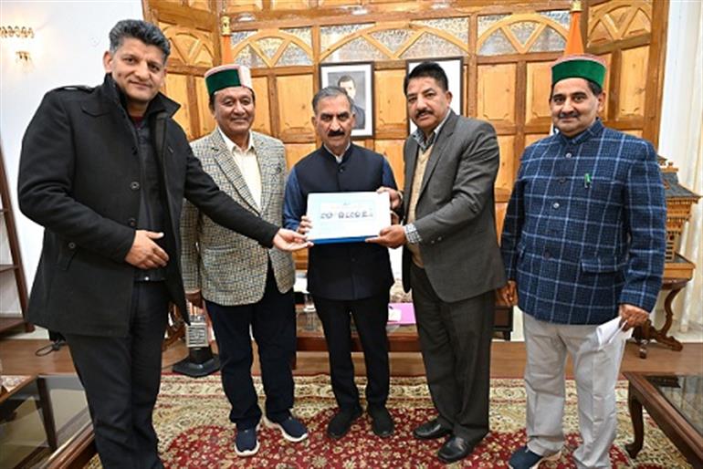 Chairman State co-operative Bank presents CTB to CM